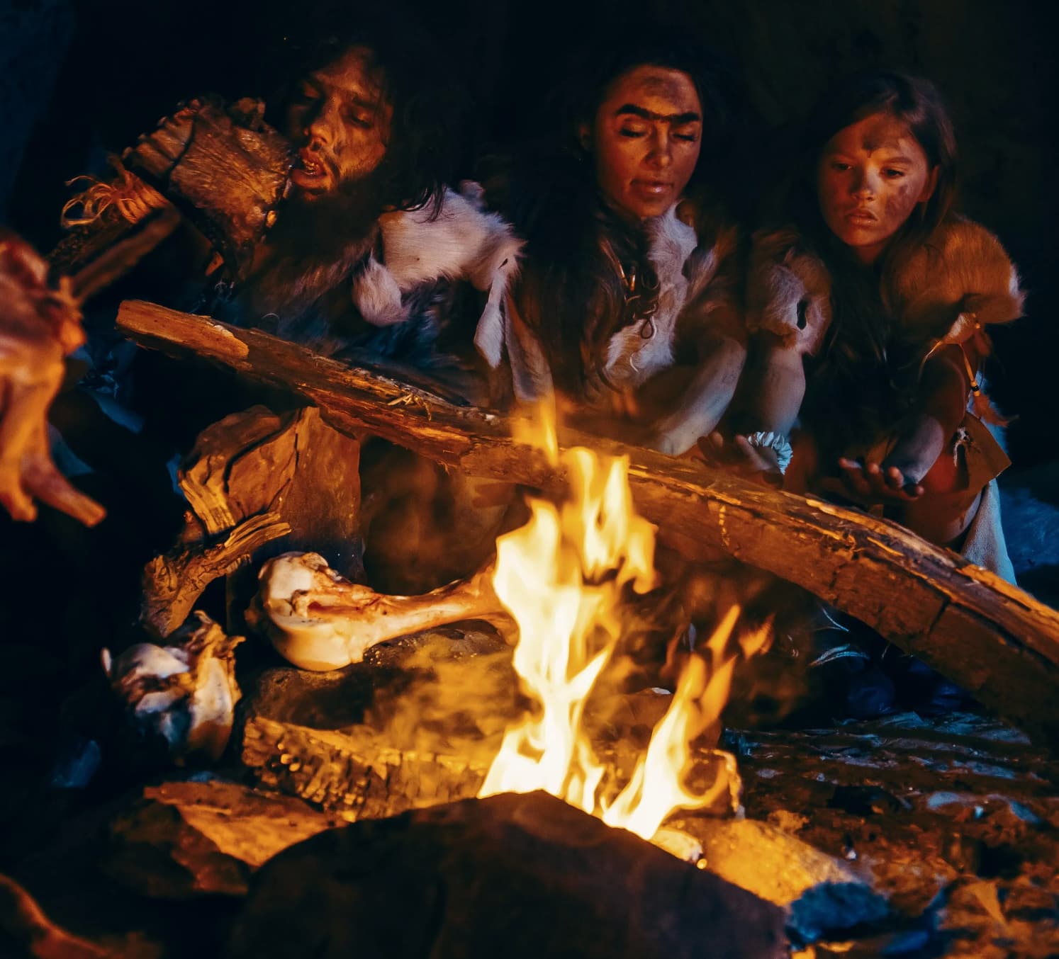 neanderthal around a fire